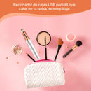 depilador de cejas recargable plateado en neceser blanco con brochas polvo y lápiz de cejas portátil