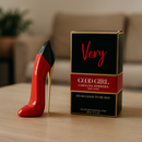 Perfume frasco en forma de zapato rojo y caja negra y roja Carolina Herrera sobre mesa comprar Good Girl Glam Ecuador