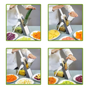 rebanador rallador multifuncional ecuatoriano en blanco con manivela cortando zanahoria pepino y papas