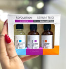 Trío de sueros faciales Revolution con sueros de ácido hialurónico, retinol y vitamina C para el cuidado de la piel