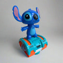 Figura infantil Stitch musical con luces LED sobre vehículo rodante azul ideal para decorar hogar